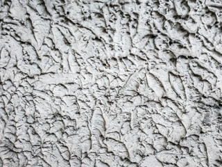 Close up grunge grey concrete wall texture background, sharp stucco texture style, house wall exterior design in vintage style.