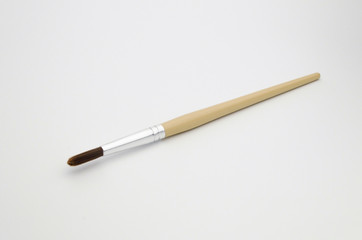 The paint brush isolated on the white background