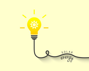 Solar energy concept. Light bulb with shiny sun inside.