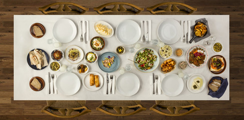 Traditional dishes on the big wooden table