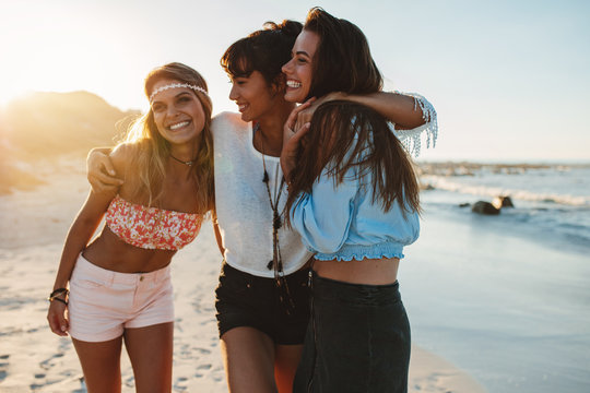 Women friends enjoying beach vacation