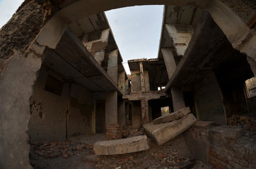 Fototapeta na wymiar Abandoned residential building of 50-th.Sary Shagan.Former Soviet anti-ballistic missile testing range.Kazakhstan 