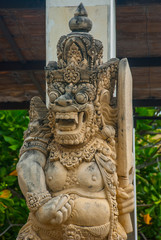 Garuda Wisnu Kencana Cultural Park, small statue of a Balinese spirit stone. Bali. Indonesia.