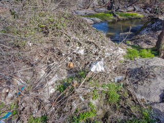 Polluted river full of garbage