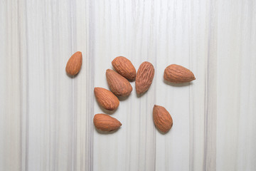 almond nut on wood table image