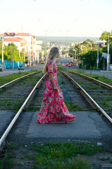 Naklejka premium beautiful girl bright long dress