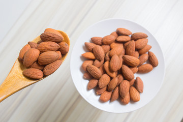 almond nut on wood table image