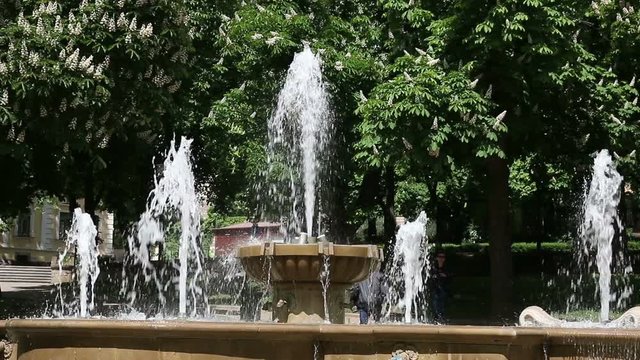 fountain in park Pecs Hungary spring season