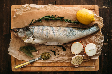 Fish preparation ingredients on cutting board