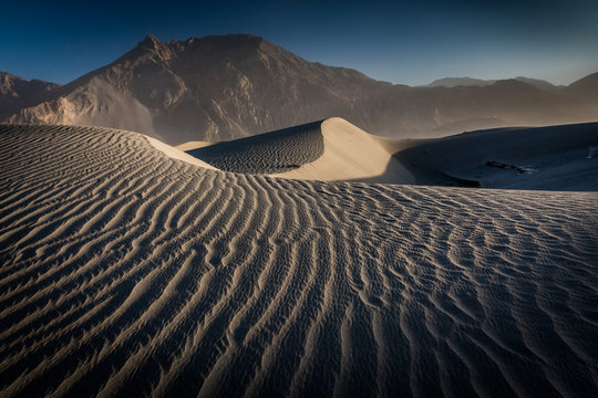 Sand dunes at Hunder village in Nubra valley in the Indian Himalaya. Diskit, Ladakh, India