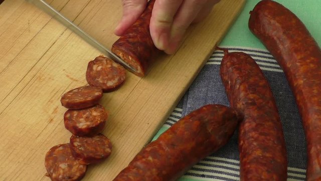 Traditional homemade sausage on the wooden cutting board
