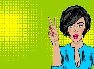 Beautiful sexy positive girl show peace symbol two fingers, pink open lips style pop art. Comic book colored halftone background. Vector dot illustration. For comic text advertisement.