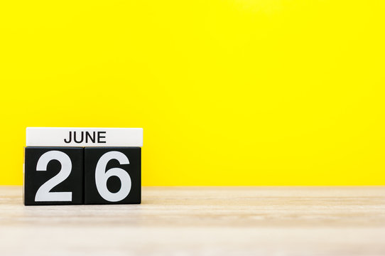 June 26th. Day 26 of month, calendar on yellow background. Summer day. Empty space for text. International Day against drug abuse and illicit trafficking