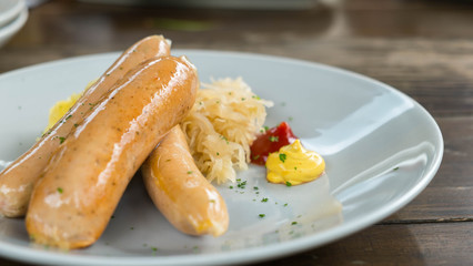 Sausage and sauce on plate