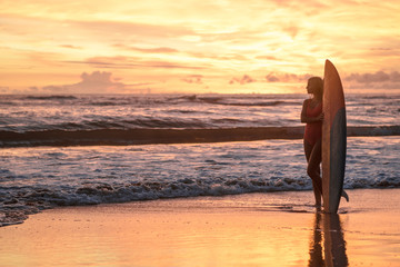 Fototapeta na wymiar Surfer on the beach
