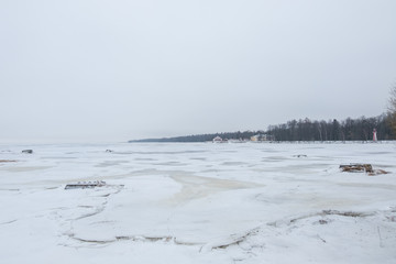 Frosty sea in winter, full of snow.