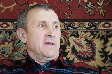 Unhappy old caucasian man