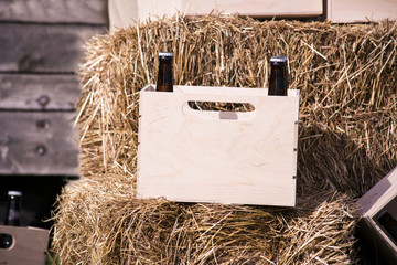 bottle of beer in a wooden box