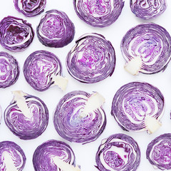 Fresh vegetables in a cut on a white background. Pattern from vegetables. Food background. Cut red cabbage. 