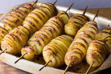 Baked potatoes on a skewer