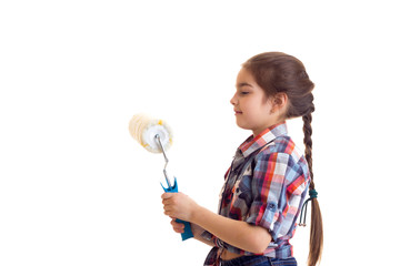 Little girl holding white roll