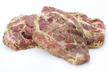Pork chop, marinated. Isolated on the white background.