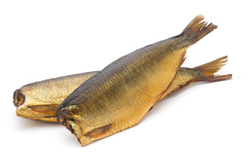 Smoked trout in front of a white background.