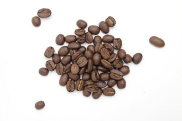 The top view of coffee beans isolate on white background
