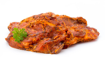 Pork chop, marinated. Isolated on the white background.