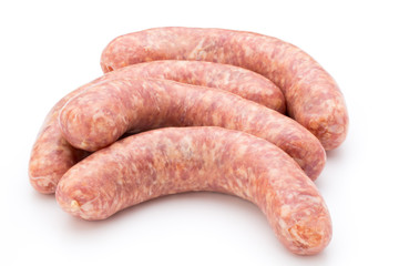 Raw sausage with parsley leaf isolated on white background.