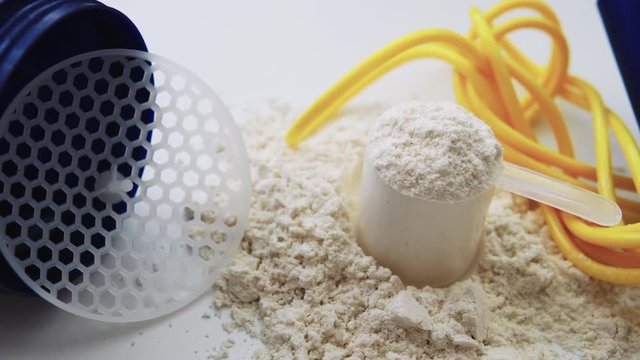 sports nutrition and supplements in bodybuilding close-up. Protein and servings for sports. Protein powder, close-up