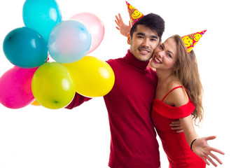 Obraz na płótnie Canvas Young couple with balloons
