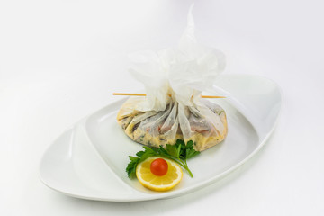 Japanese dish served in a little white bag