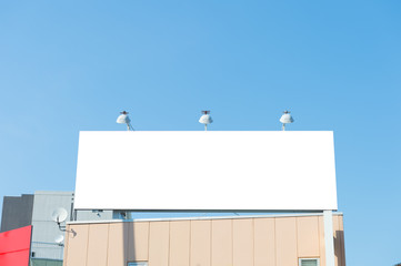 Large blank billboard on a street wall, banners with room to add your own text