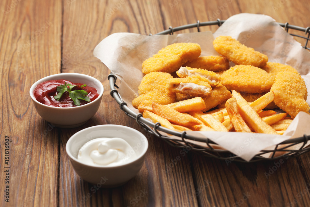 Wall mural Chicken nuggets and french fries