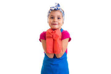 Girl in apron and gloves