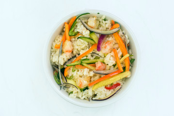 Top view of rice with prawns and vegetables