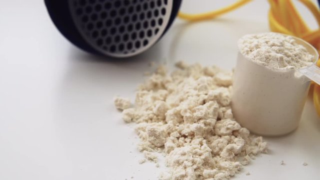 sports nutrition close-up protein. Dose of protein in the sports diet cocktail. Sports supplements and vitamins