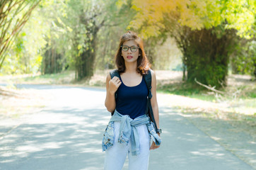 Beautiful woman in the forest, relax in nature.