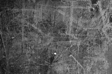 Wall fragment with scratches and cracks