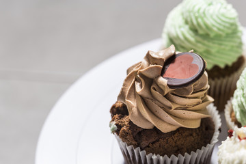 Many sweet handmade muffins close up