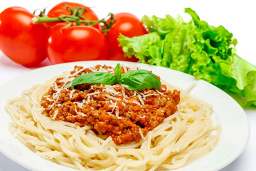 Spaghetti bolognese on a white plate