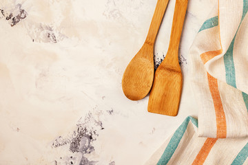 Kitchen background with towel and cooking tools.