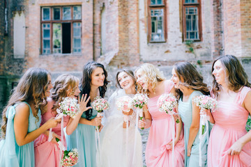Beautiful bride with her pretty bridesmaids