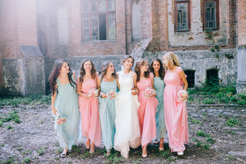 Beautiful bride with her pretty bridesmaids