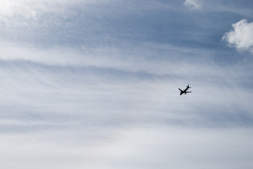 airplane in the sky in sunny day