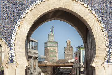the Bab Bou Jeloud (or Blue Gate), the main entrance into the old medina, Fes el Bali, in Fez, Morocco. The Moorish-style gate was built in 1913