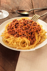 Plate of pasta with meat and tomato sauce
