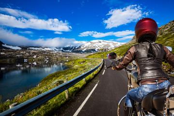 Biker girl First-person view, mountain serpentine.