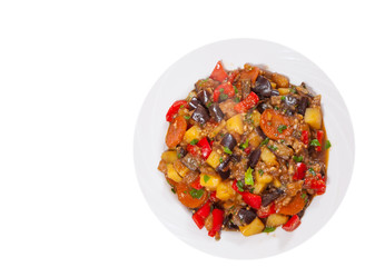 stewed vegetables. eggplant, peppers, onions, carrots, potatoes.. top view. isolated on white